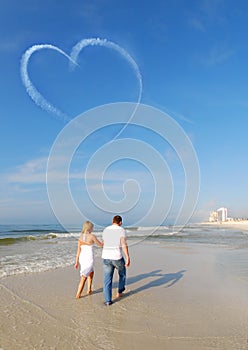 Couple strolling on beach