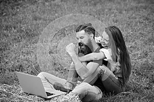 Couple of student and girl study on laptop on grass