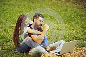 Couple of student and girl study on laptop on grass