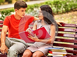 Couple student with notebook outdoor