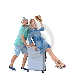 Couple with suitcase on white background