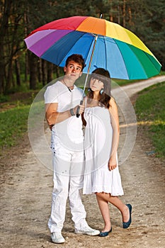 Couple in the summer rain