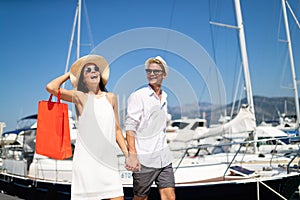 Couple on summer vacation enjoying travel and shopping