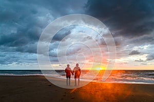 A couple during the sunset at the beach