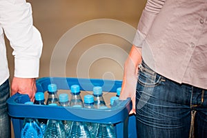 Couple in supermarket buying beverages