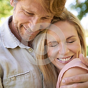 Couple, support and hug in park for romance, nature and commitment in marriage or relationship. Mature people, love and