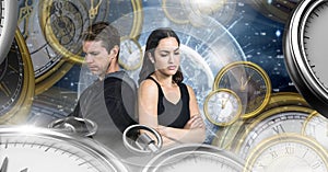 Couple in surreal time and space with clocks