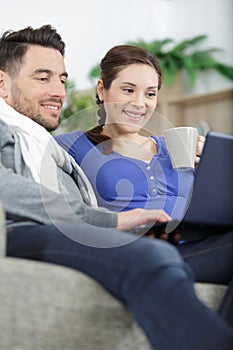 Couple with tablet  in modern apartment