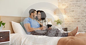 Couple, tablet and relax in home bedroom, laugh or morning with video, movie or meme for love, care or hug. Man, woman