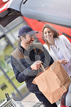 Couple with take-away bag from grocery sotre photo