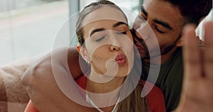 Couple take selfie, happy and kiss with hug, love and playful with fun bonding together and spending quality time at