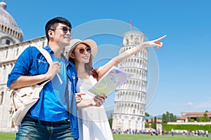 Couple take world map in Italy