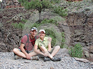 Couple taking a break from hiking