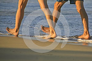 Couple Taking a Brisk Walk on Cabarete Bsy