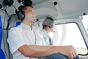 couple taking flight in private aircraft