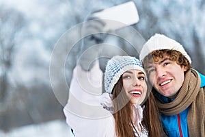 Couple taking picture of themselves