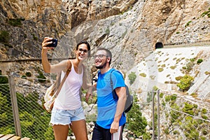 Couple taking a selfie in mountainous place