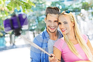 Couple taking a selfie with smartphone