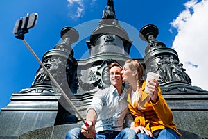 Couple taking selfie on Theaterplatz in Dresden