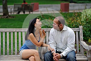 Couple talking in a city park