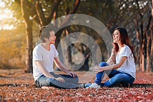 Couple talking and laghing in the park