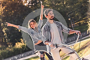 Couple with a tandem bicycle