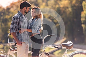 Couple with a tandem bicycle