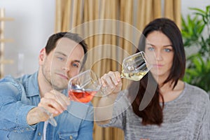 Couple tasting glass wine