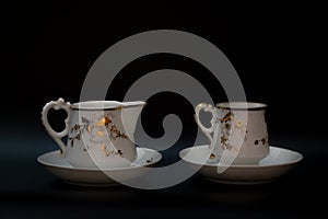 A couple of tea and milk jug made of porcelain and cover gilt. These dishes were made during the Tsarist Russia.