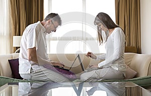 Couple in their computers