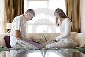 Couple in their computers