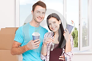 Couple at their new empty apartment