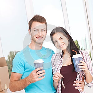 Couple at their new empty apartment