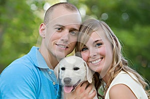 Couple With Their Puppy