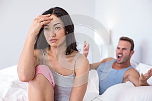 Couple in to argument on bed