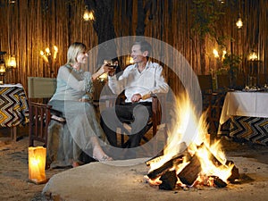 Couple Toasting At Outdoor Nightclub