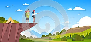 Couple Of Tourists With Backpacks Over Beautiful Nature Landscape Background Man And Woman Hiking