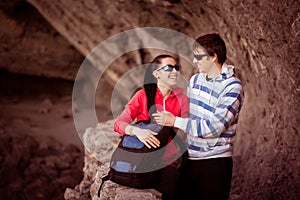 Couple of tourists in the rocky grot photo