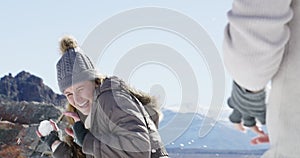 Couple, trail and playing with snow, winter and dog on mountain, husky and holiday. Vacation, playful and romance for