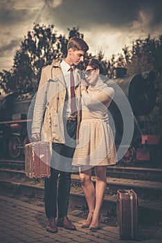 Couple on a train station