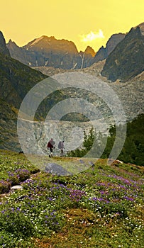 Couple of travelers with backpacks photo