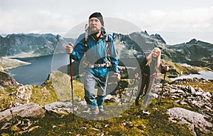 Couple travelers hiking in mountains family traveling