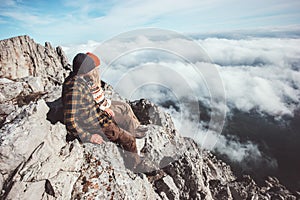 Couple travelers Man and Woman sitting on mountains