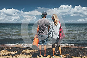 Couple Travelers Man And Woman Standing On Seashore Adventure Travel Relax Concept