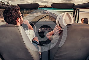 Couple travelling by car