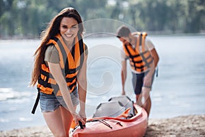 Couple travelling by kayak