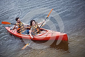 Couple travelling by kayak