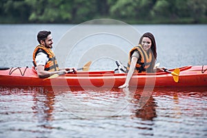 Couple travelling by kayak