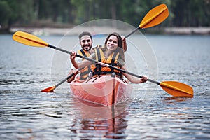 Couple travelling by kayak