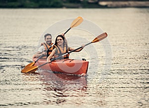 Couple travelling by kayak